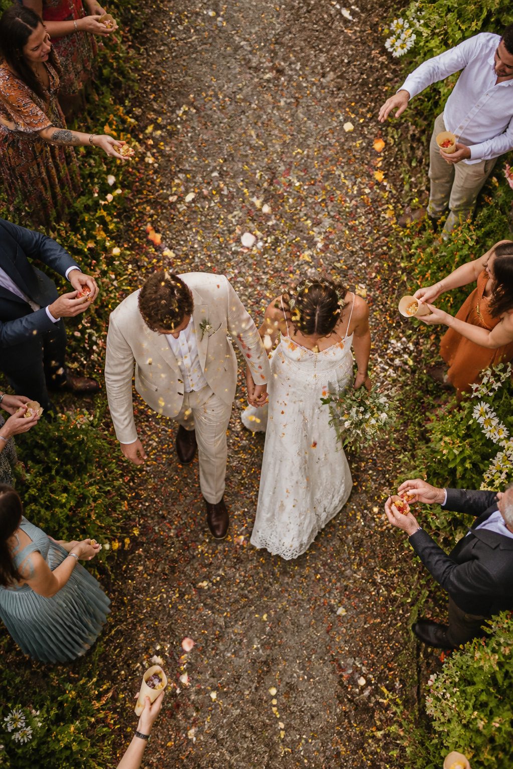 Dried petal confetti ready for an outdoor wedding exit.