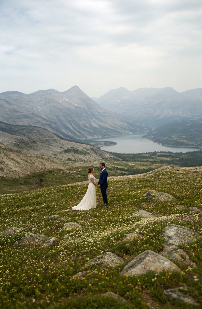 A couple eloping in a scenic outdoor location.