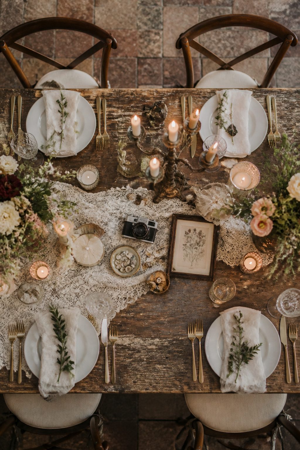 Decor featuring vintage and modern pieces in a wedding setting.